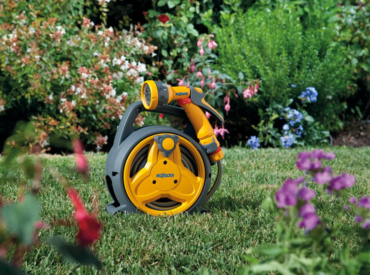 Hozelock 2425 Катушка Мини Pico Reel со шлангом и комплектом фитингов (7,5 мм*10 м шланг, 3 коннектора, пистолет-распылитель), шт