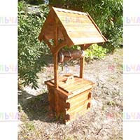 Декоративный колодец из натурального дерева украсит ваш участок