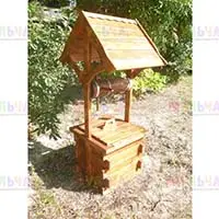 Декоративный колодец из натурального дерева украсит ваш участок