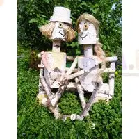 Влюбленная парочка из березовых чурбаков станет украшением вашего сада